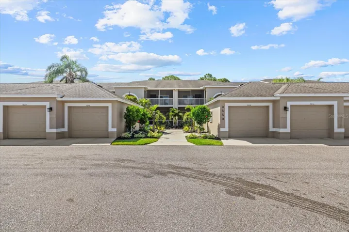9550 BUILDING PHOTO SHOWCASING ONE CAR GARAGE