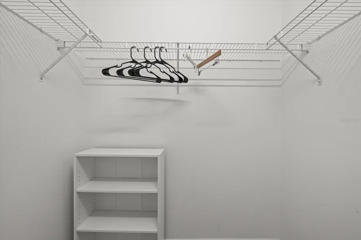 HER PRIMARY CLOSET