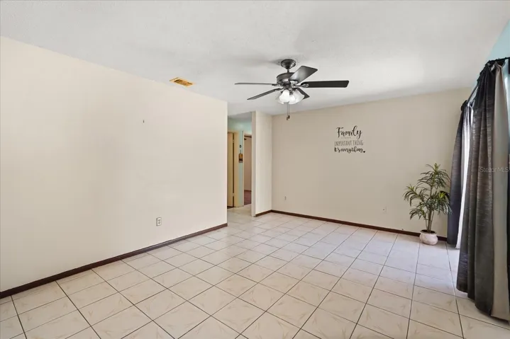 Living room leading to bedroom's hallway