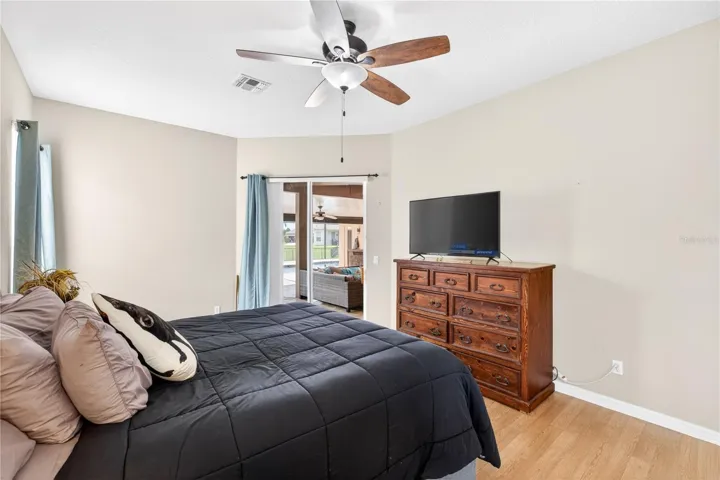 primary bedroom with views of lanai