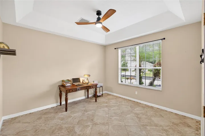 This room is presently used as an office. Can be formal dining room as well