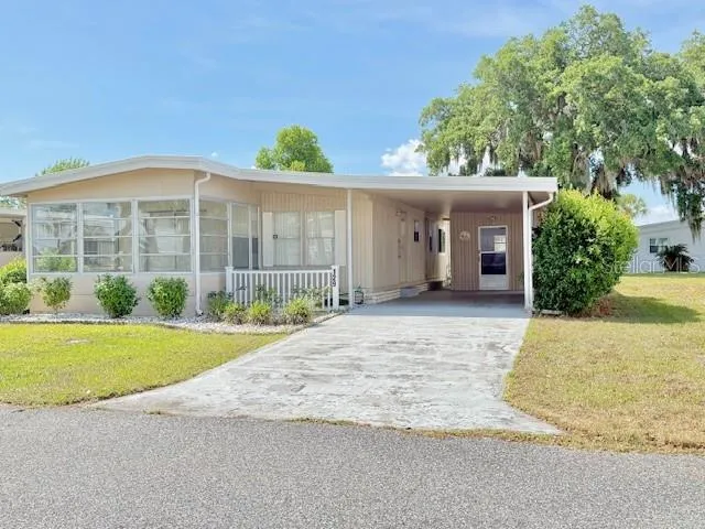 Front with Carport