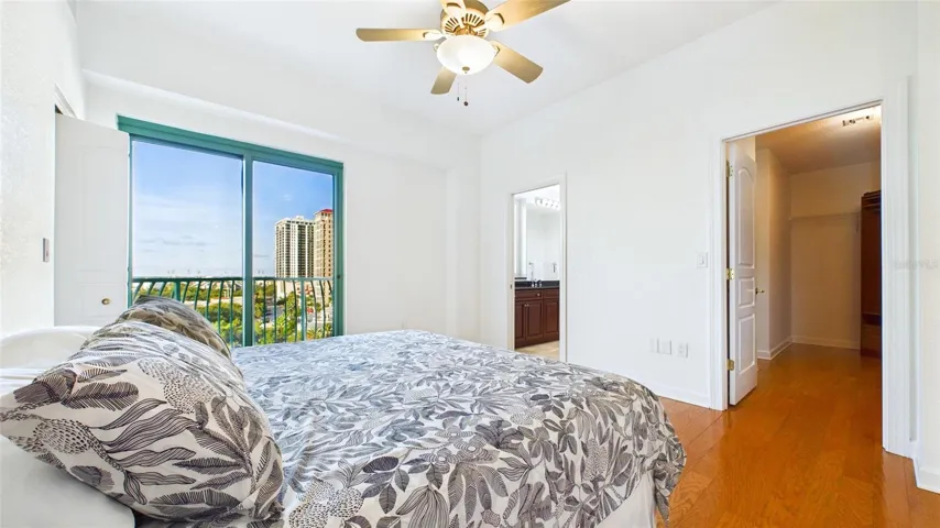 Primary bedroom with petite balcony