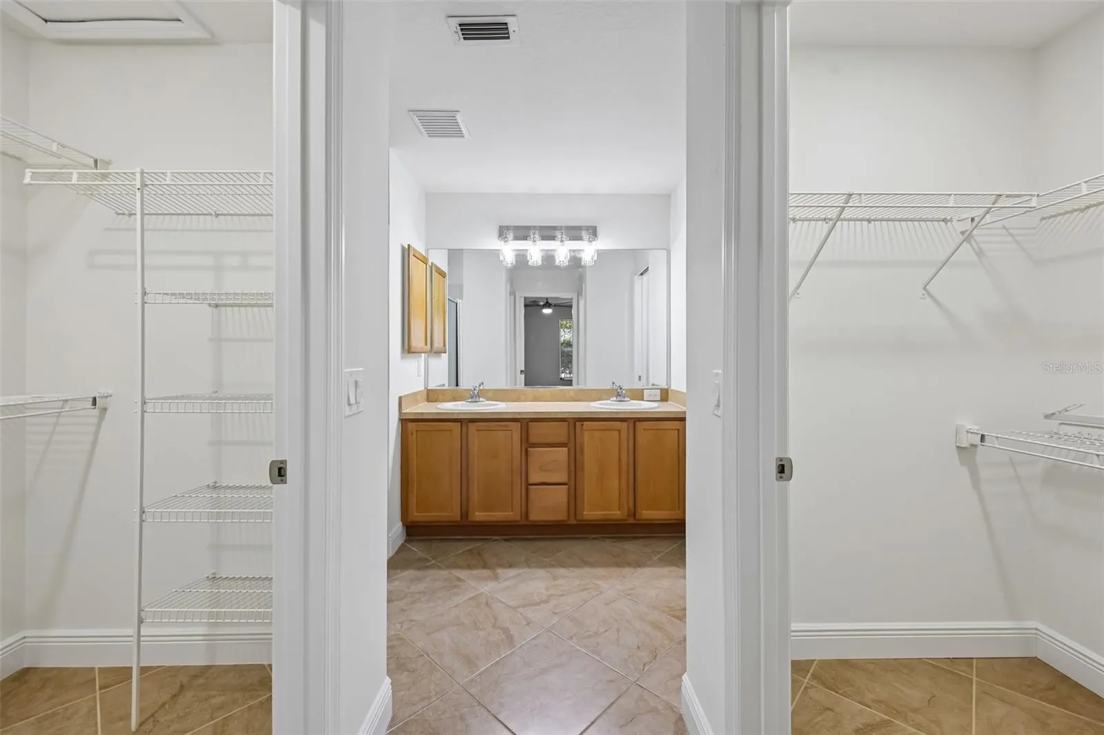 Master Bedroom Closets into Bath