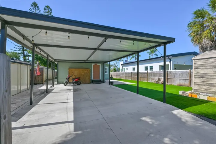 Gated Backyard Parking off Alley w/ Carport
