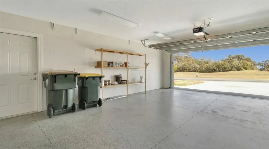 View inside Garage upon entering from Laundry Room