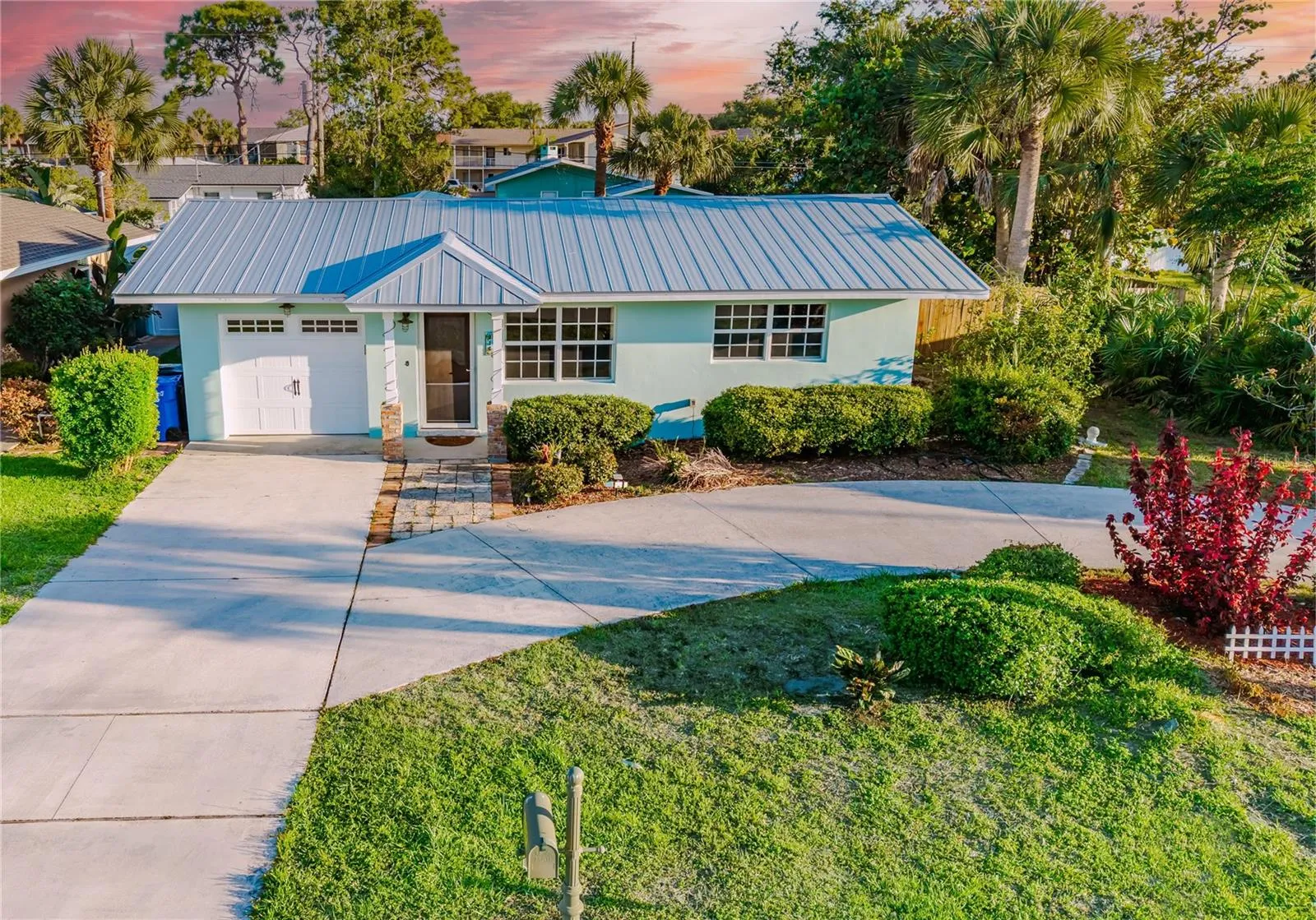 Freshly painted exterior with landscaped front yard