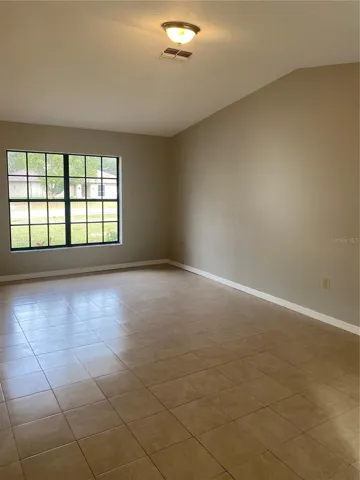 Large living room with high ceilings
