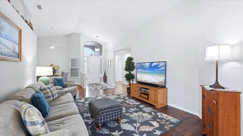 LIVING ROOM TO FOYER