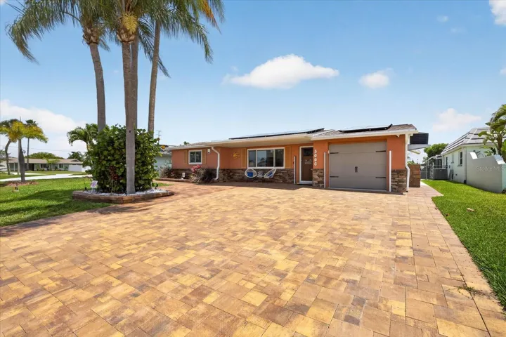 Front of home sealed paver driveway