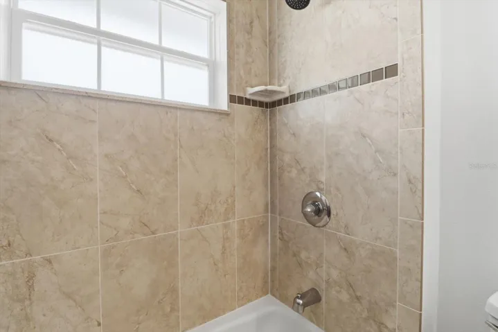 Bathroom 2 w/ Tiled Shower/Tub Combo