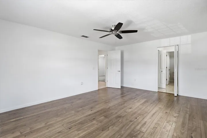 Master Bedroom w/ PERGO Flooring & Ensuite
