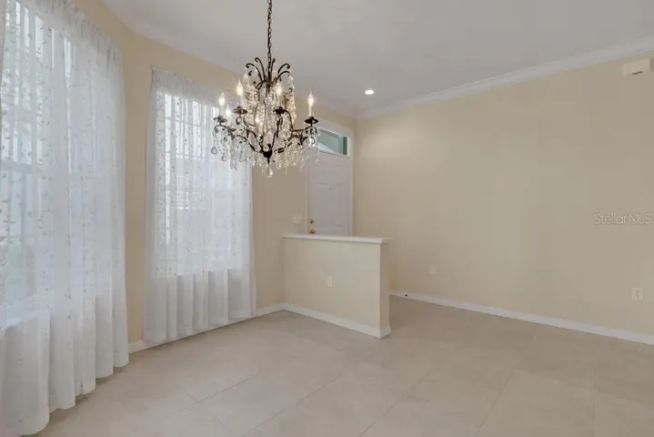 Tall windows allow beautiful filtered light to flood the entire space.