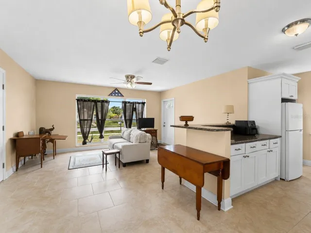 LivingDining_21915CalvinLn_PortCharlotte_OpenConcept.jpg