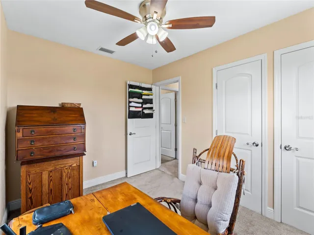 Bedroom_21915CalvinLn_PortCharlotte_NaturalLight_Corner.jpg