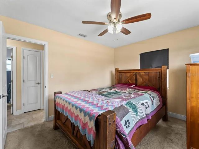 Bedroom_21915CalvinLn_PortCharlotte_PrivateEntry_Corner.jpg