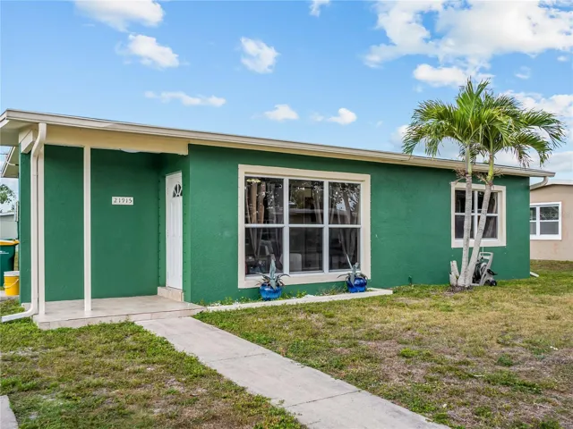 FrontExterior_21915CalvinLn_PortCharlotte_CurbAppeal_Close.jpg