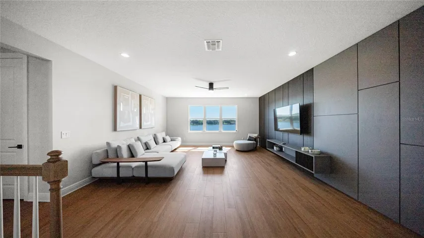 The upstairs lounge with the dark accent wall