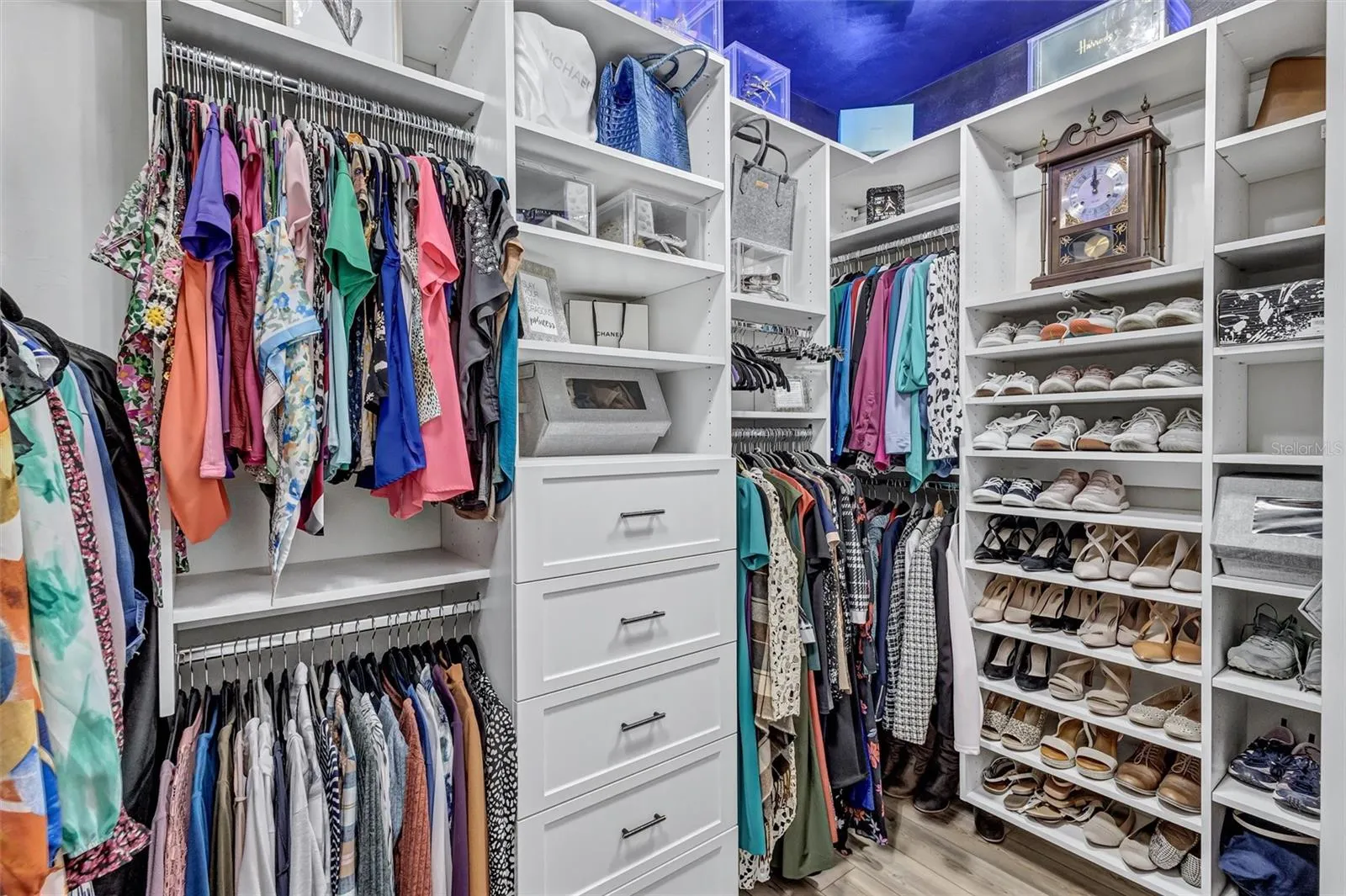 Primary walk-in custom closet