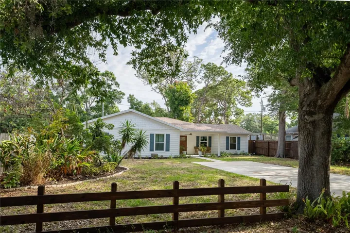 Large driveway with plenty of off-street parking in front of home