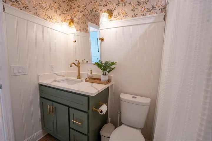 Bathroom 2 - updated bathroom with gold hardware and faucets