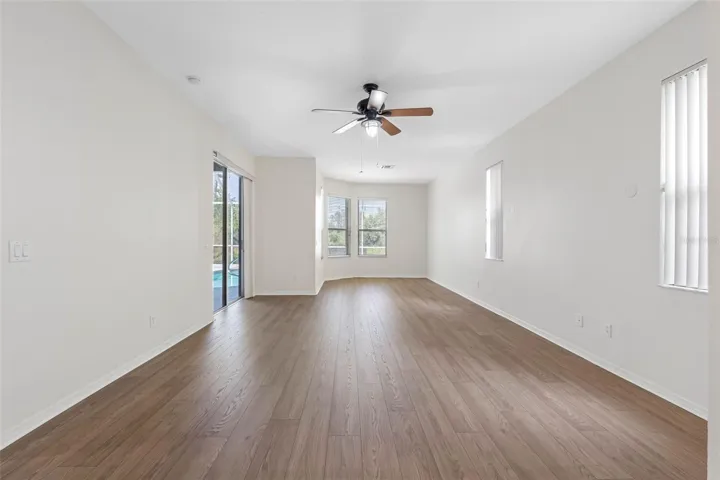 Primary bedroom with sliders to the pool