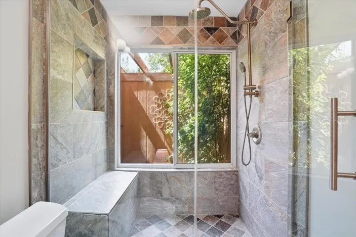 Full Guest Bathroom with newly replaced glass