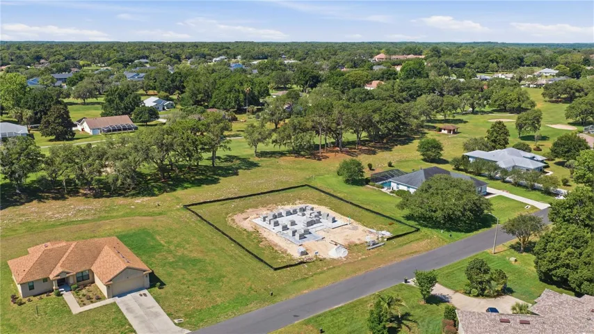 VIEW WITH GOLF COURSE ADJACENT TO BACKYARD