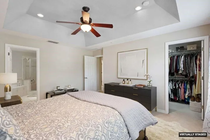 *Virtually Staged* Primary suite with a walk in closet & en-suite bath