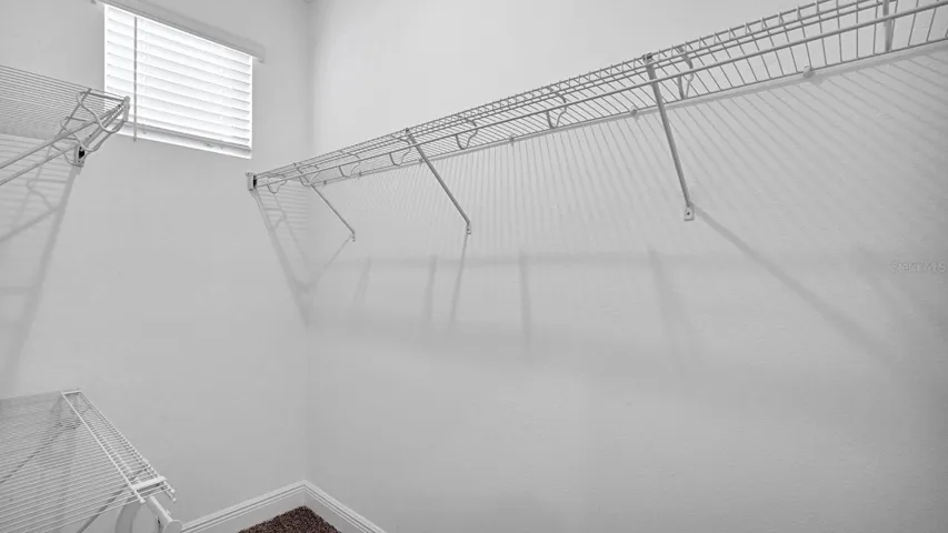 Primary suite walk-in closet