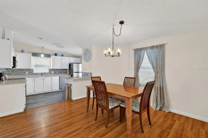 Dining area with newer fixture