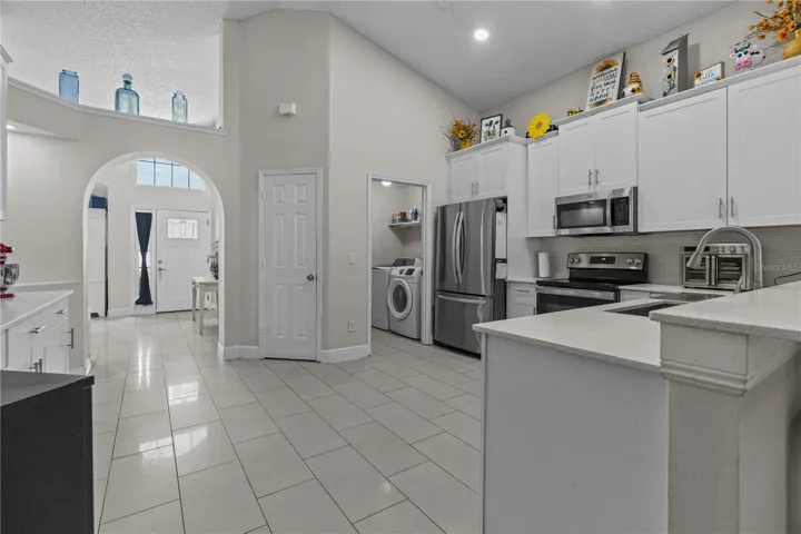 Entire view of the Kitchen with Laundry room