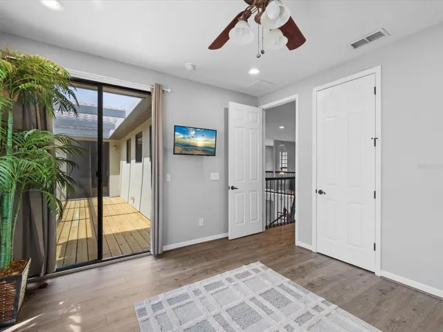 4th bedroom with sliders to balcony