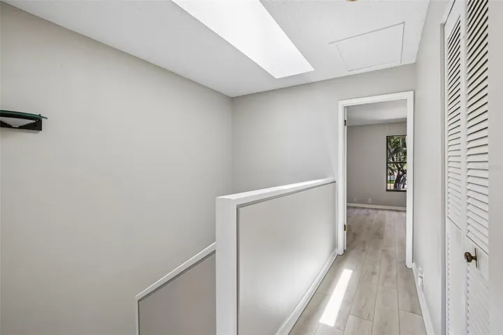 STAIRS AND HALL WAY SPLIT THE BEDROOMS FOR ADDED PRIVACY