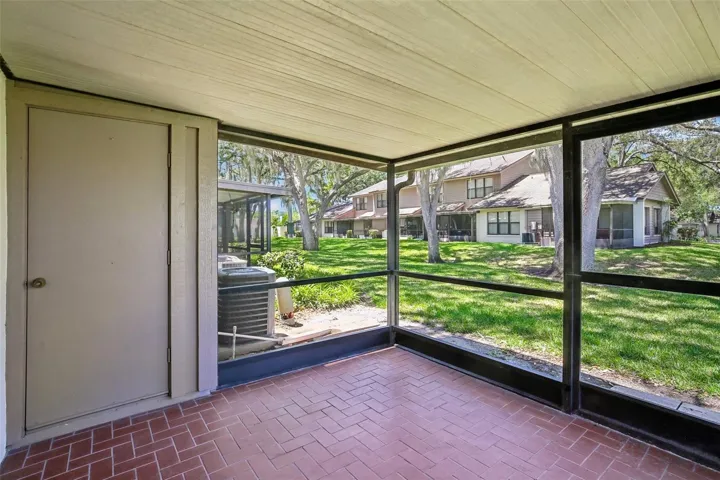 SCREENED BACK LANAI WITH STORAGE CLOSET