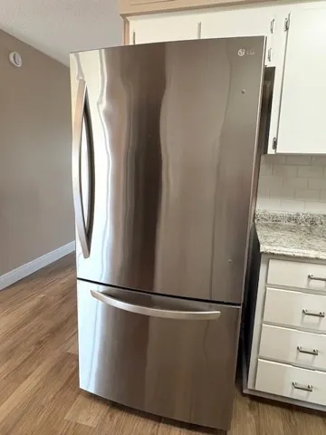 Stainless fridge with pull out freezer.