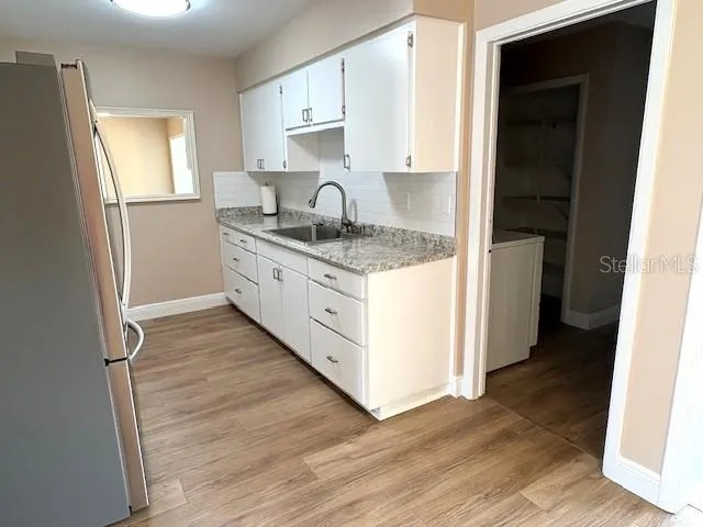 Galley style kitchen, with entry into the laundry room and pantry.