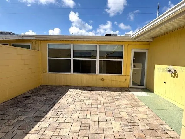 Courtyard toward bonus room windows.