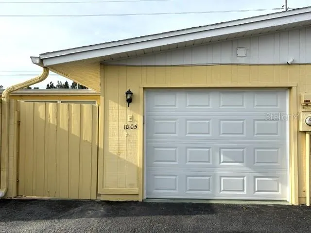 The one car garage is located in the back of the home, updated garage door.