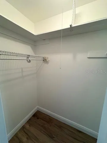 Step in closet in the second bedroom.