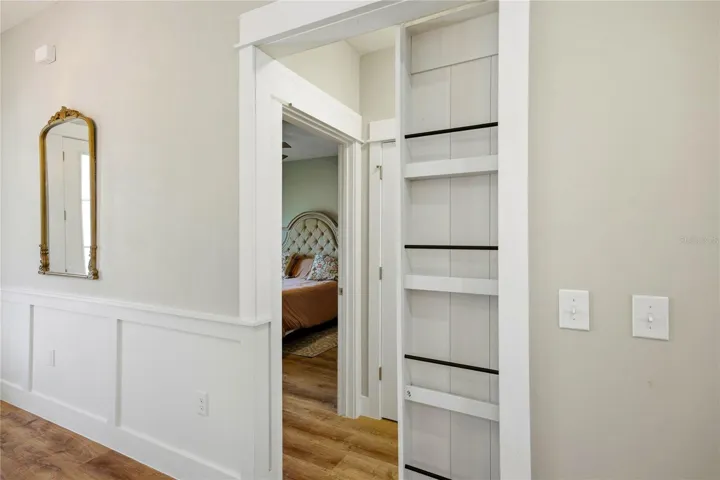 Built in Pocket door Bookshelf