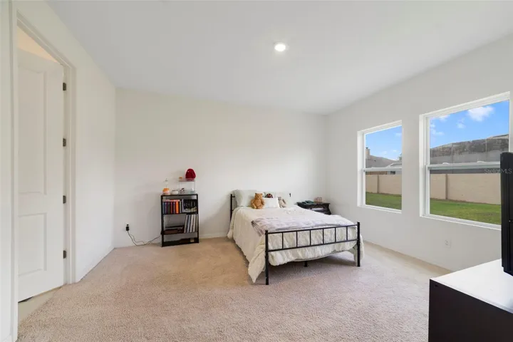 The Primary Suite provides a peaceful retreat, complete with a walk-in closet and a SPACIOUS EN SUITE BATH.