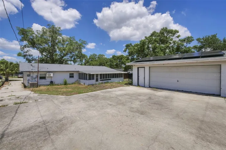 Detached 2-car garage, owned solar.