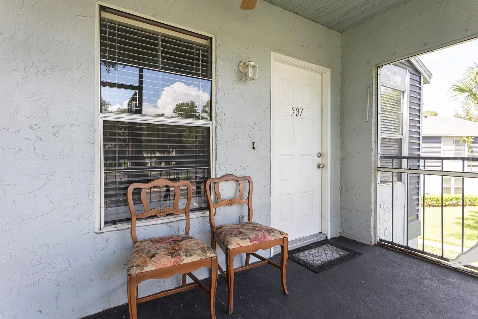 Screened in Front Porch with Washer/Dryer in Separate Closet