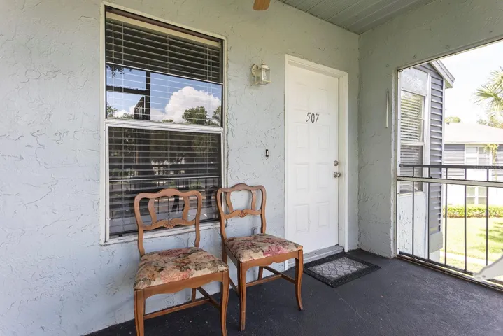 Screened in Front Porch with Washer/Dryer in Separate Closet