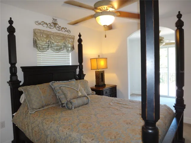 Can you see the ensuite office space just beyond the archway of Bedroom #3?