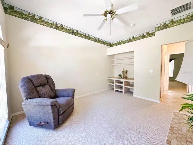 Bedroom 2 with built in shelf/ closet decorative shelf