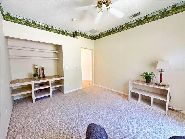 Bedroom 2 with closet/ built in shelving