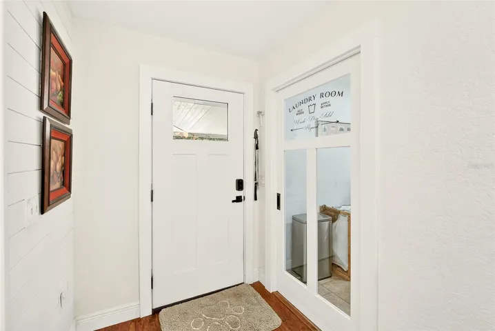 Back door to porch and entrance to Laundry Room