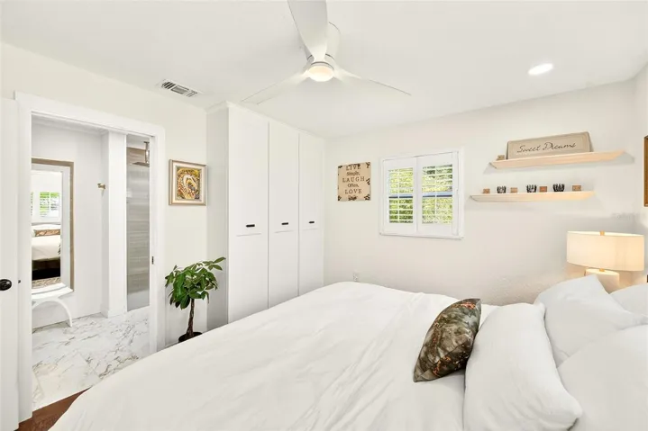 Primary bedroom with built in closet
